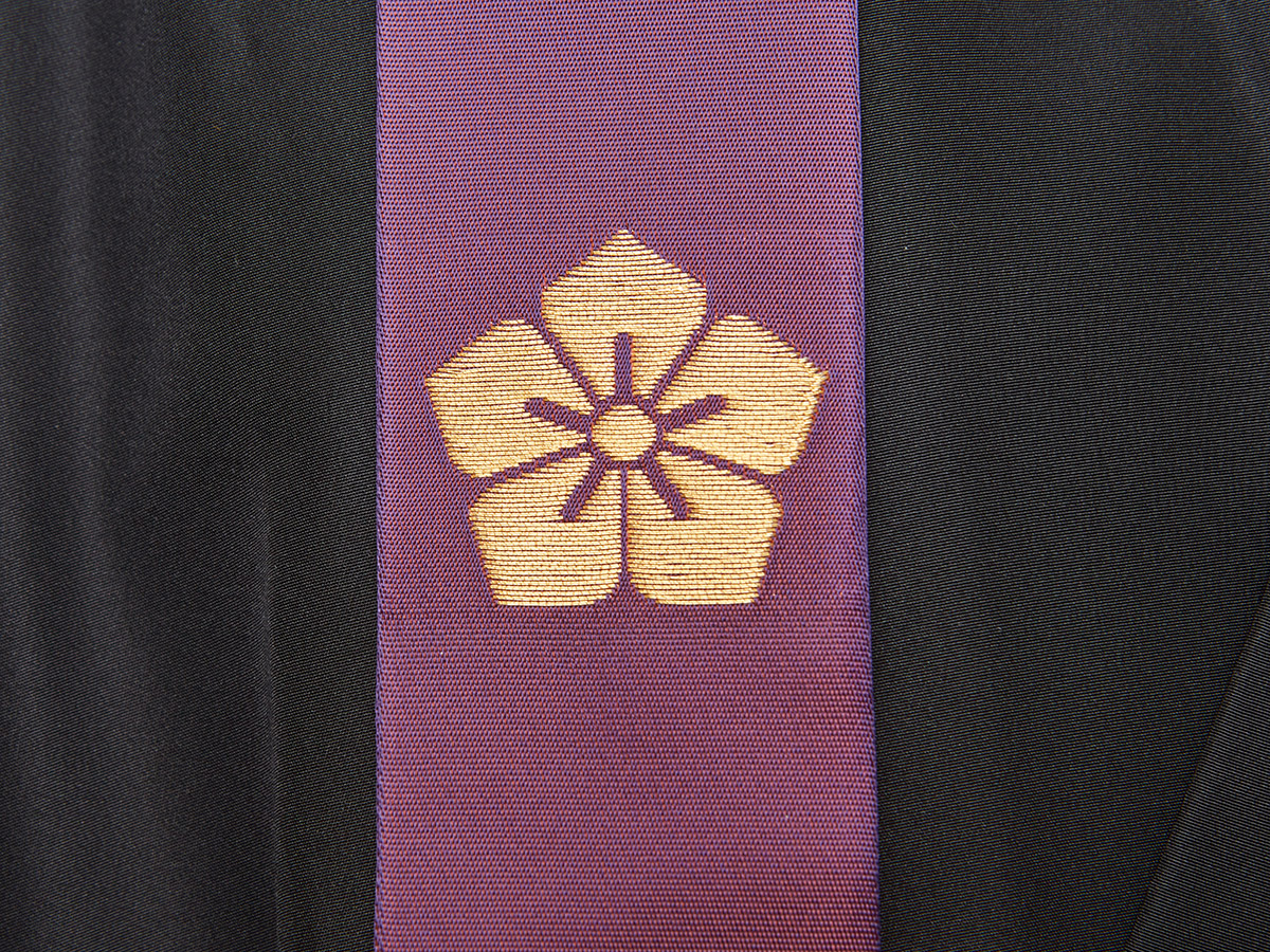 古代紫無地金紋輪袈裟　桔梗紋